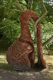 Sculptures Prints: Modern contemporary wicker sculpture in garden of stately home