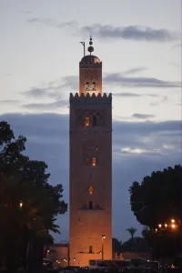 Moroccan Prints: Mosque minaret in city at dusk, Koutoubia Mosque, Marrakesh, Morocco, april
