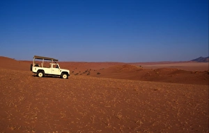 Namibian Prints: Namibia Landrover in the Namib Deaert
