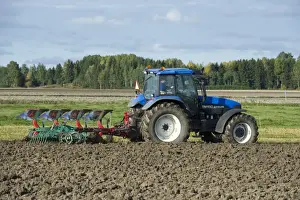 Plough Prints: New Holland TM150 tractor with reversible plough and harrow