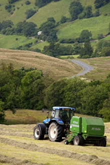 Agriculture Prints: New Holland TM155 tractor with McHale f550 round baler