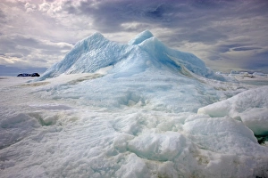 Pack ice and trapped blue iceberg, Devil Island, Weddell Sea, Antarctica, November
