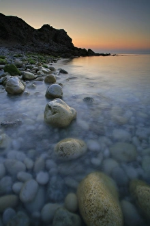 Pebbles Prints: Pebbles on beach at sunrise, Church Ope Cove, Isle of Portland, Dorset, England, july