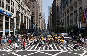 Cars Prints: Pedestrians crossing road in city