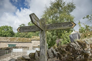 Footpath Prints: Pennine Way and Public Footpath signs on farm