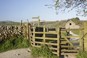 Directions Prints: Pennine Way signpost and wooden kissing gates along public footpath
