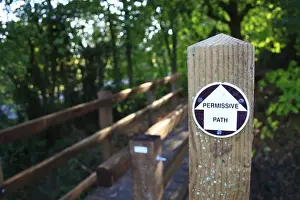 Directions Prints: Permissive Path sign beside footbridge at entrance to new Millenium woodland