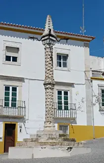 Pillary in small town square, used in early times to hang people up for punishment, Elvas, Portalegre District