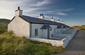 Pilot cottages used to service pilot boats and lifeboats on tidal island, Llanddwyn Island
