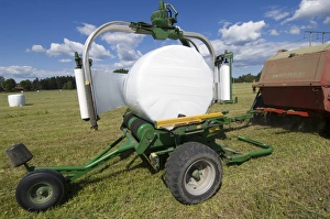 Wrapped Prints: Plastic wrapped round silage bale, wrapped by mechanical bale-wrapper, Sweden