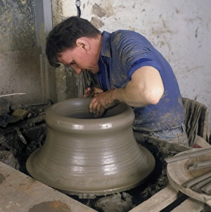 Wheels Prints: Potter making large garden pots, England