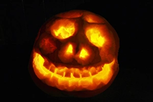 Tradition Prints: Pumpkin (Cucurbita sp. ) Jack O Lantern lit at night