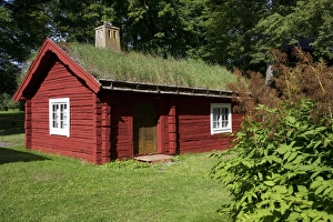 Cottages Prints: Red log cabin with turf roof, Sodermanland, Sweden, august