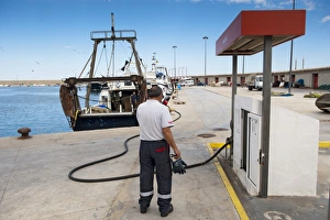 Industry Prints: Refueling trawler boat in port, Xabia, Alicante Province, Valencia, Spain, May