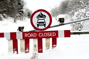 Climate Prints: Road Closed sign on closed road snowgates because of severe weather disruption