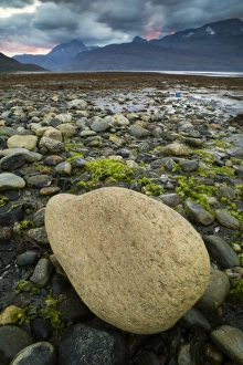 Northern Europe Prints: Rock on beach during low tide at sunset