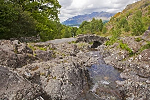 Rocky stream and stone bridge, Ashness Bridge, Keswick, Lake District, Cumbria, England, may