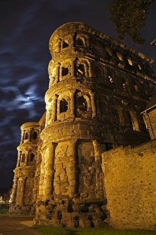Germany Prints: Roman city gate illuminated at night