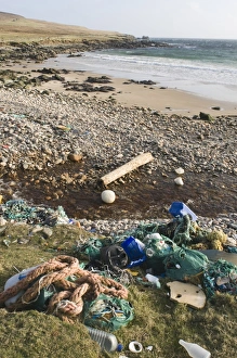 Pollution Prints: Rubbish washed up on beach from sea, Shetland Islands, Scotland, april