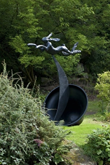 Running Prints: Running hare sculpture in garden of stately home