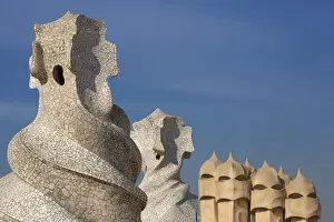 Sculptures Prints: Sculptures on roof of building designed by architect Antoni Gaudi