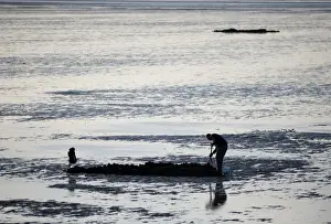 Sports Prints: Sea angler bait digging for worms