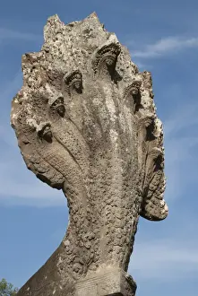 Mythology Prints: Seven-headed Naga sculpture at end of walkway in Khmer temple