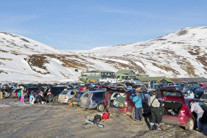 Ski resort carpark, buildings and chairlift in snow, Glenshee Ski Centre, Grampian Mountains, Aberdeenshire, Highlands