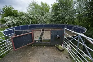 Muck Prints: Slurry lagoon on farm, surrounded by screen of hawthorn bushes, Cumbria, England, May
