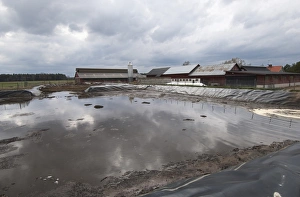 Muck Prints: Slurry pond and farm buildings, Sweden, may