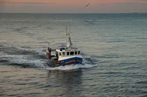 Industry Prints: Small crab and lobster fishing boat Pride and Joy WY 218 returning to port at dusk