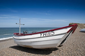 Industry Prints: Small fishing boat on shingle beach, Weybourne, Norfolk, England, August