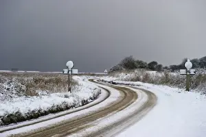 Wintery Prints: Snow covered A149 coast road, Cley Marshes Reserve, Cley, Norfolk, England, december