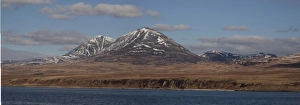 Islay Prints: The snow covered Paps of Jura viewed over the Sound of Islay