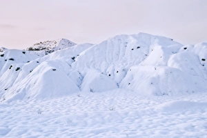 Quarry Prints: Snow covered sand and gravel quarry at sunrise, Dorset, England, december