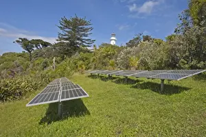Renewable Prints: Solar energy panels and lighthouse on island wildlife sanctuary