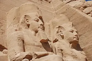 Sculptures Prints: Statues of Pharaoh Ramesses II decorating facade of temple
