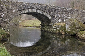 Trending: Stone bridge over river, Cwm Pennant, Snowdonia, Gwynedd, North Wales, february