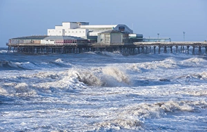 Storm Prints: Stormy sea and Victorian pier in seaside resort town