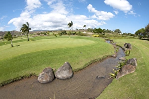 Game Prints: Stream running by practice green on golf course