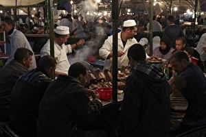 Meat Prints: Street vendors serving lambs heads at food stall