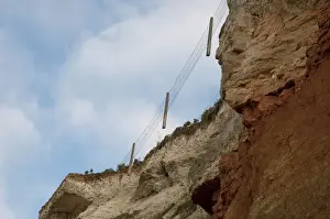 Erodes Prints: Suspended fencing caused by erosion of chalk and carrstone sea cliffs