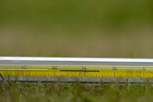 Measure Prints: Thermometer on garden surface to measure ground temperature, Cumbria, England, august