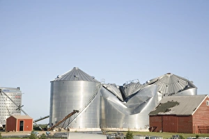 Tornado storm damage to grain bins on farm, Oakes, North Dakota, U. S. A. july 2011
