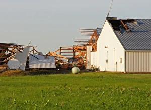 Local Prints: Tornado storm damage to hangers of local airport, Oakes, North Dakota, U. S. A. july 2011