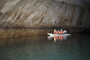 Canoe Prints: Tourist boat in cave on subterranean river, Puerto Princesa Subterranean River N. P
