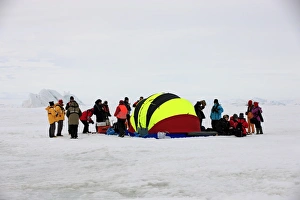 Helicopter Prints: Tourists waiting for helicopter at emergency tent