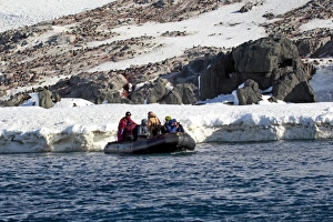 Leaving Prints: Tourists in Zodiac inflatable boat