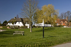 Directions Prints: Traditional old village green and signpost, Ham, West Berkshire, England, march