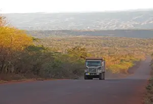 Transports Prints: Trucking Bauxite aluminium ore along Alcoa Road from opencast mines to port of Cabo Rojo